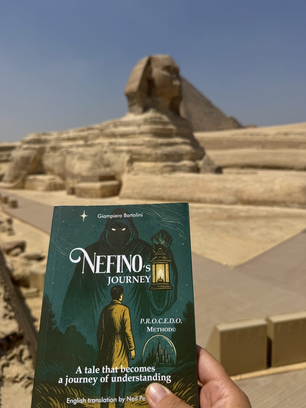 Nefino's Journey held up in front of the Sphinx